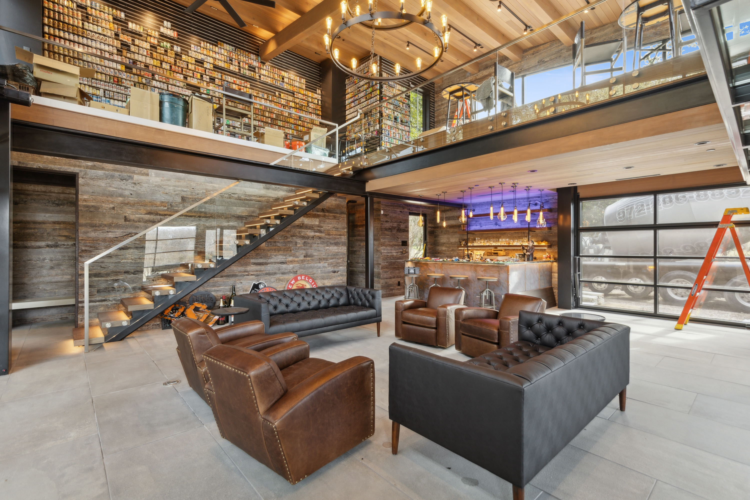 Custom entertainment lounge with reclaimed wood and leather furnishings